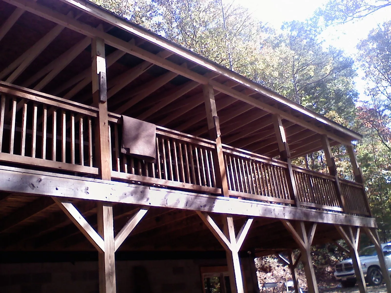 Timber framing under a new elevated porch and deck — Roof Leak Repair in Colrain by Roofing Brothers